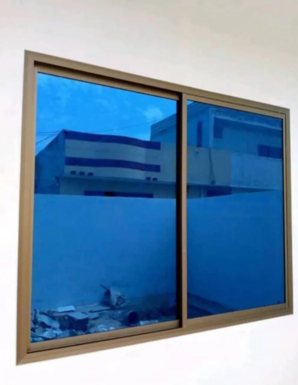 Aluminium window with blue tinted glass
